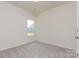 Bedroom with carpet flooring, a window view, and a calming atmosphere at 1630 Troon Dr, Salisbury, NC 28144