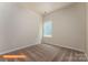 Cozy bedroom featuring neutral walls and carpeting, complemented by a window providing natural light at 1630 Troon Dr, Salisbury, NC 28144