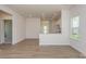 Open living space showcasing seamless flow to the kitchen, creating an inviting atmosphere at 1630 Troon Dr, Salisbury, NC 28144