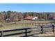 Large red barn with horse pasture at 172 Tuckertown Rd, New London, NC 28127