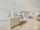 Open concept basement with kitchen island and seating area at 172 Tuckertown Rd, New London, NC 28127