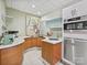 Modern, curved kitchen design with stainless steel appliances at 172 Tuckertown Rd, New London, NC 28127
