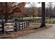 Long private driveway with a rustic wooden fence at 172 Tuckertown Rd, New London, NC 28127