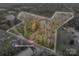 Aerial view of lot lines surrounded by colorful fall trees at 2073 Mauney Rd, Bessemer City, NC 28016