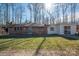 Charming brick ranch-style home with well-maintained lawn and a welcoming entrance at 2073 Mauney Rd, Bessemer City, NC 28016