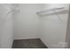 A walk-in closet featuring shelving at 2121 Carriage Woods Ln, Kannapolis, NC 28081
