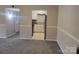 An interior view highlighting seamless flow between living area and modern kitchen at 2121 Carriage Woods Ln, Kannapolis, NC 28081