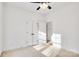Bright bedroom with double doors and carpet flooring at 408 N Boyd St, Gastonia, NC 28052