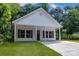Charming single-story home featuring a covered porch and a well-manicured front yard at 408 N Boyd St, Gastonia, NC 28052