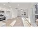 Bright kitchen with white cabinets and hardwood floors at 408 N Boyd St, Gastonia, NC 28052