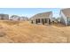 Home with covered patio and grassy backyard at 4219 Moxie Way, Charlotte, NC 28215