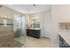 Spa-like bathroom features a large walk-in shower, double vanity, and updated fixtures at 4219 Moxie Way, Charlotte, NC 28215