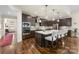 Spacious kitchen with dark cabinetry, stainless steel appliances, and an island at 4219 Moxie Way, Charlotte, NC 28215