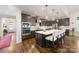 Modern kitchen with island, stainless steel appliances, and hardwood floors at 4219 Moxie Way, Charlotte, NC 28215