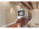 Upper hallway with hardwood floors and arched alcoves at 500 Wyndham Ln, Waxhaw, NC 28173