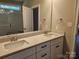 Bathroom vanity with double sinks, quartz countertop, and shaker cabinets offers both style and function at 609 Shiloh Unity Rd, Lancaster, SC 29720
