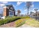 Community retail area with lush landscaping and various shopping destinations at 6411 Aldworth Ln, Charlotte, NC 28226