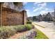 Community entrance with brick signage and landscaped surroundings at 6411 Aldworth Ln, Charlotte, NC 28226