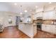 Bright, open kitchen with stainless steel appliances, granite countertops and a center island at 6411 Aldworth Ln, Charlotte, NC 28226