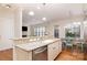Features a breakfast bar, granite counters, stainless appliances and hardwood floors at 6411 Aldworth Ln, Charlotte, NC 28226
