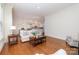 Open-concept living room seamlessly connects to the kitchen, perfect for entertaining and daily living at 6411 Aldworth Ln, Charlotte, NC 28226