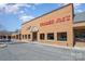 A commercial complex featuring a Trader Joe's grocery store, Great Harvest Bread Co and other businesses at 6411 Aldworth Ln, Charlotte, NC 28226