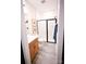 Clean bathroom with a walk-in shower and modern vanity at 8052 Cedarsmith Ct, Charlotte, NC 28217