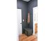 Built-in bench with storage and coat hooks, perfect for a mudroom at 8052 Cedarsmith Ct, Charlotte, NC 28217