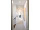 Bright hallway with neutral walls and carpet flooring at 8052 Cedarsmith Ct, Charlotte, NC 28217