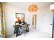 Bright home office features a workspace with a desktop computer and built-in shelving at 8052 Cedarsmith Ct, Charlotte, NC 28217