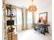 Home office with a desk, shelves and large windows at 8052 Cedarsmith Ct, Charlotte, NC 28217