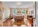Cozy bedroom featuring floral wallpaper and hardwood floors at 842 North Center St, Hickory, NC 28601