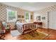 Charming bedroom with floral wallpaper and a comfortable bed at 842 North Center St, Hickory, NC 28601