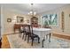 Spacious dining room with hardwood floors, chandelier and built-in cabinetry at 842 North Center St, Hickory, NC 28601