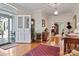 Bright and spacious entryway with hardwood floors and stained glass door at 842 North Center St, Hickory, NC 28601