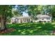 Charming ranch home with a covered porch and manicured lawn at 842 North Center St, Hickory, NC 28601
