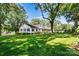 Side view of a charming home with a large grassy yard at 842 North Center St, Hickory, NC 28601