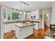 Modern kitchen with white cabinets, granite countertops, and island at 842 North Center St, Hickory, NC 28601
