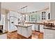 Modern kitchen with white cabinets, granite countertops, and island at 842 North Center St, Hickory, NC 28601