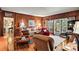 Spacious living room with hardwood floors, wood walls, and comfortable seating at 842 North Center St, Hickory, NC 28601