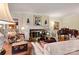 Elegant living room showcasing hardwood floors, fireplace, and period furnishings at 842 North Center St, Hickory, NC 28601