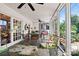 Relaxing screened porch with stone flooring and outdoor seating at 842 North Center St, Hickory, NC 28601