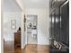 Bright entryway with hardwood floors and view of kitchen at 857 Fairbanks Rd, Charlotte, NC 28210