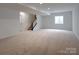 Unfinished basement with neutral carpet and plenty of storage at Lot 2 Glenview Meadow Dr # Savanh, Waxhaw, NC 28173