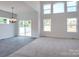 Bright dining area with sliding glass doors and a chandelier at Lot 1 Glenview Meadow Dr # Savanh, Waxhaw, NC 28173