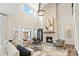 Living room with stone fireplace, high ceilings, and large windows at Lot 2 Glenview Meadow Dr # Savanh, Waxhaw, NC 28173