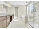 Elegant bathroom featuring a soaking tub, walk-in shower, and double vanity at 1022 Torrens Dr # 4, Monroe, NC 28110