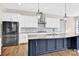 Large kitchen island with granite countertops and dark cabinets at 1022 Torrens Dr # 4, Monroe, NC 28110