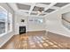 Spacious living room with hardwood floors and a coffered ceiling at 1022 Torrens Dr # 4, Monroe, NC 28110