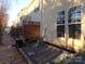 Backyard with a wooden deck and shared walkway at 10244 Blakeney Preserve Dr, Charlotte, NC 28277